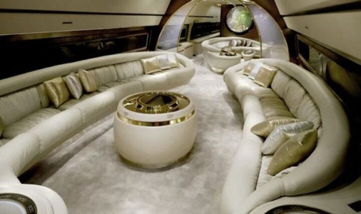 luxury private jet interior with gourmet meal