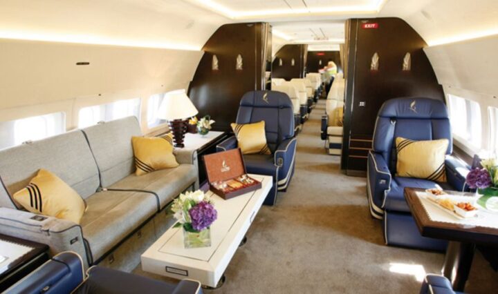 luxury private jet interior with comfortable seating