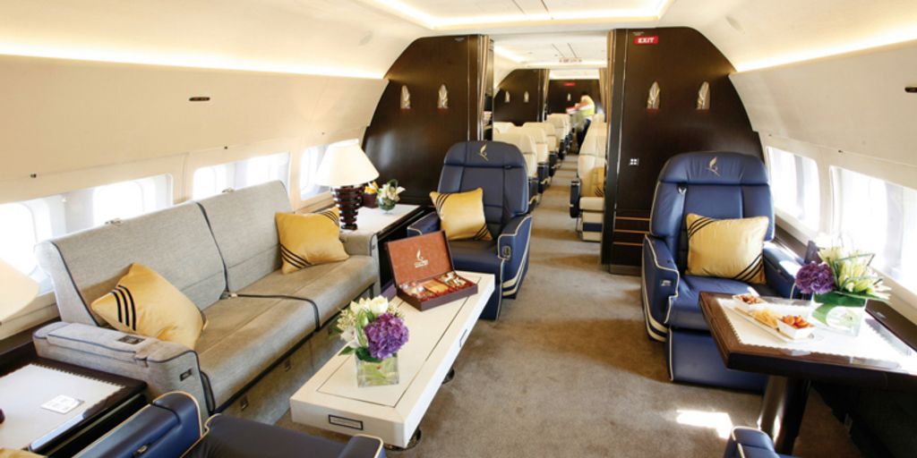 luxury private jet interior with comfortable seating