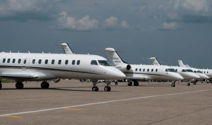 Grounded private jets at Nigerian airport due to illegal operations.