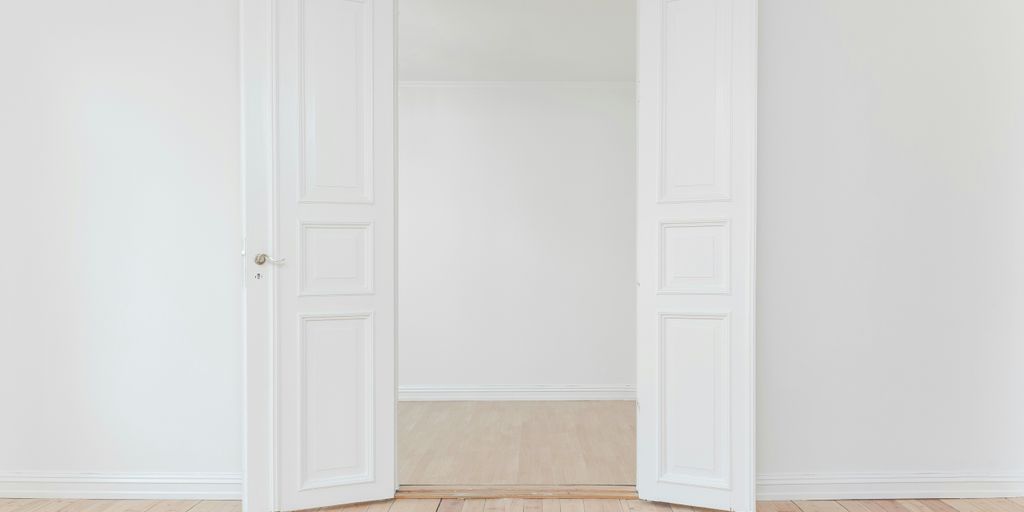 minimalist photography of open door